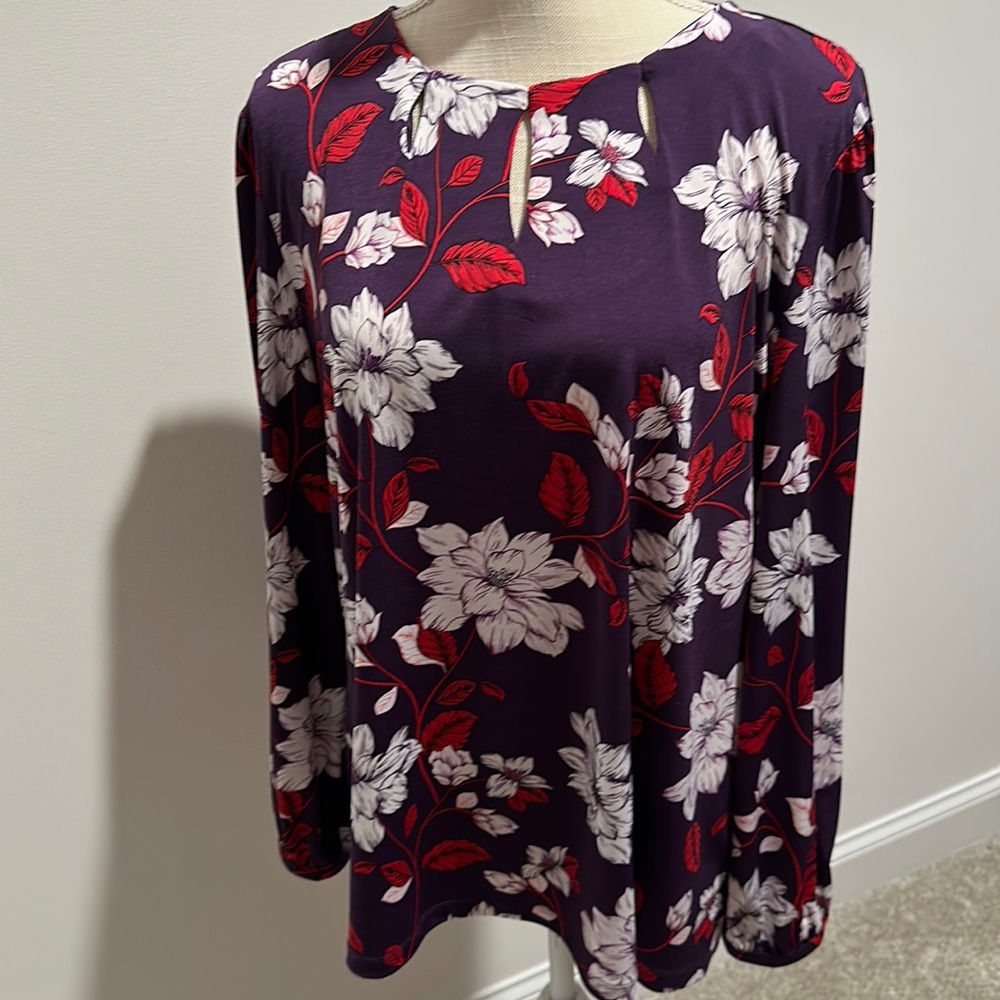 Gently worn woman’s fall long sleeve blouse